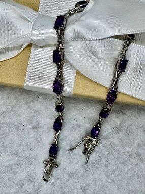 Beautiful 10 CTW Amethysts 7.5” Tennis Bracelet in Sterling Silver